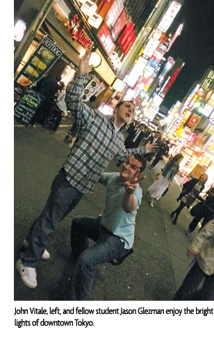 John Vitale, left, and fellow student Jason Glezman enjoy the bright lights of downtown Tokyo.