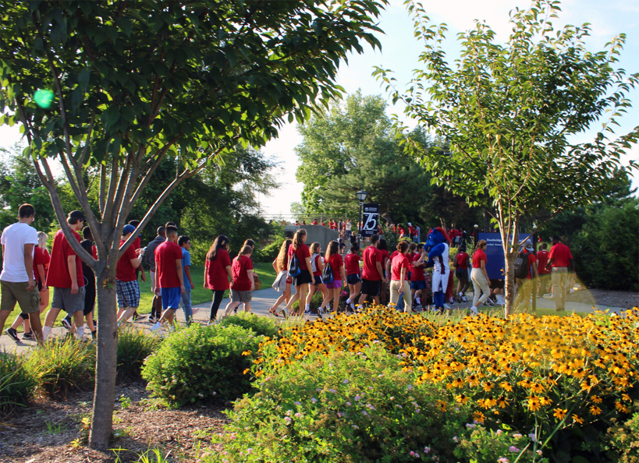 A new tradition this year: At the Illumination Ceremony, students processed across the Metropolitan Campus.