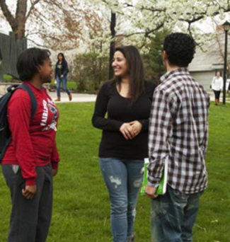 three students by a tree