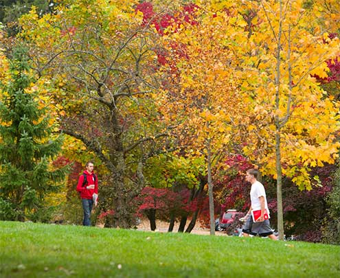 two students walking through florham campus