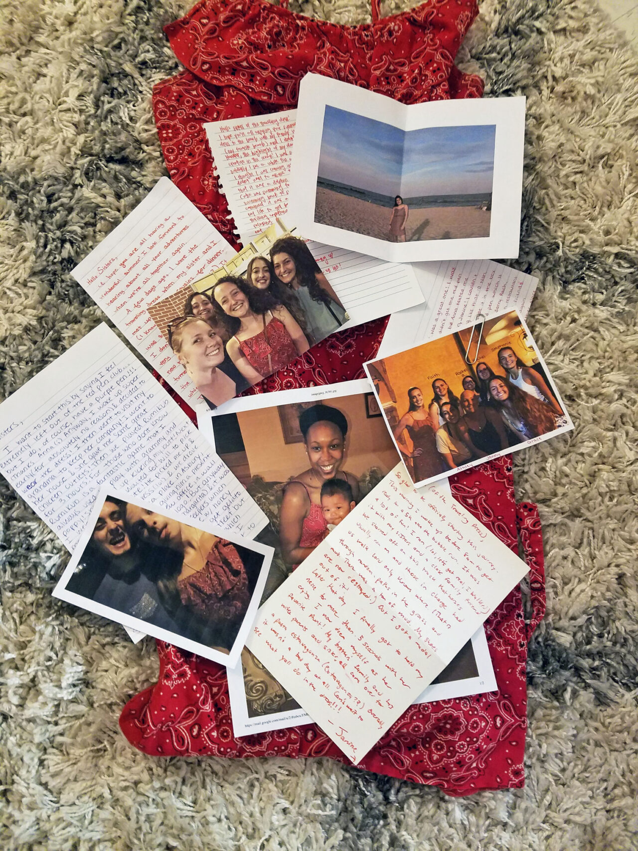 A pile of photos and hand-written notes.