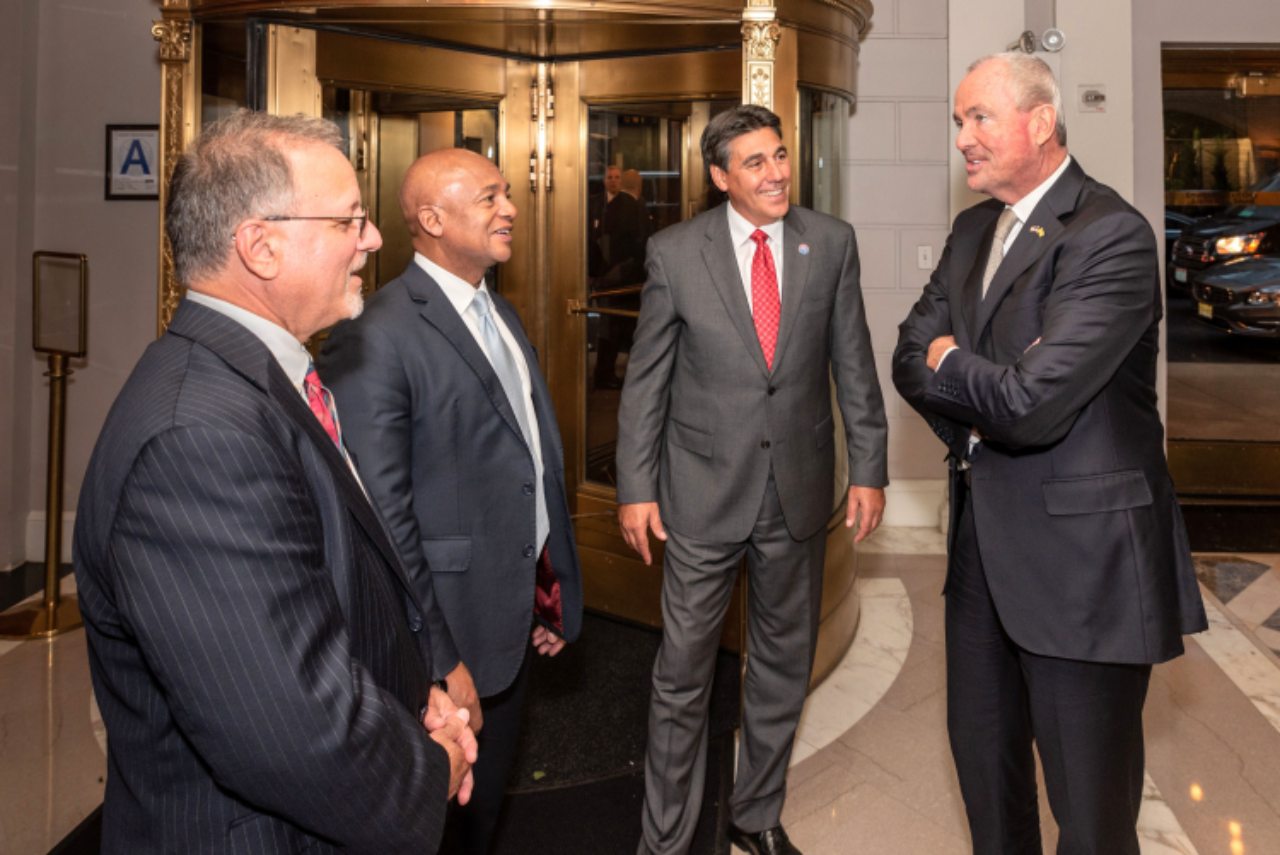 Silberman College of Business Dean Andrew Rosman, Lester Owens and FDU President Christopher Capuano chat with keynote speaker, New Jersey Governor Phil Murphy.