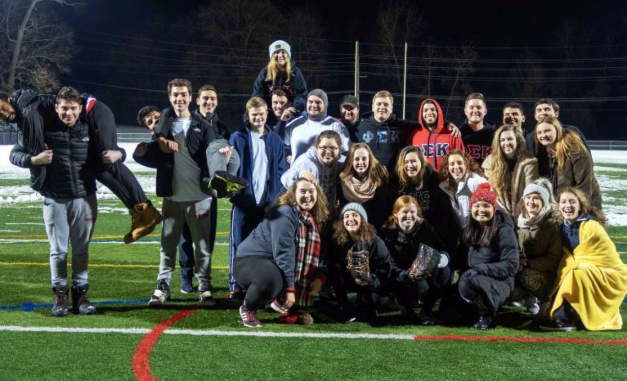 group of students on a football field