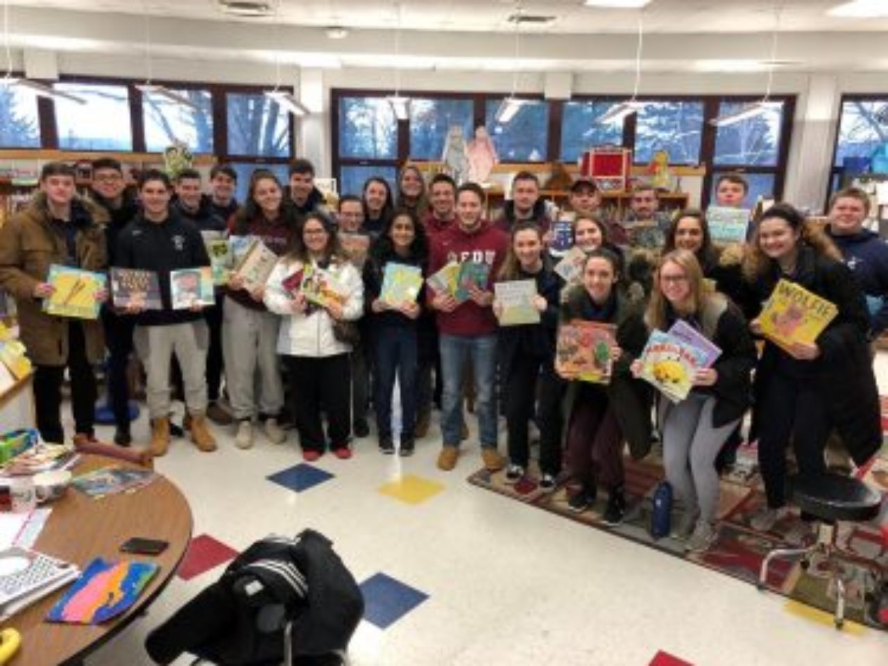 FDU Devils SAAC participates in Read Across America.