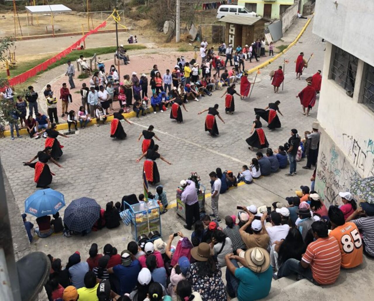 Traditional dancers in the streets of Quito, Ecuador.