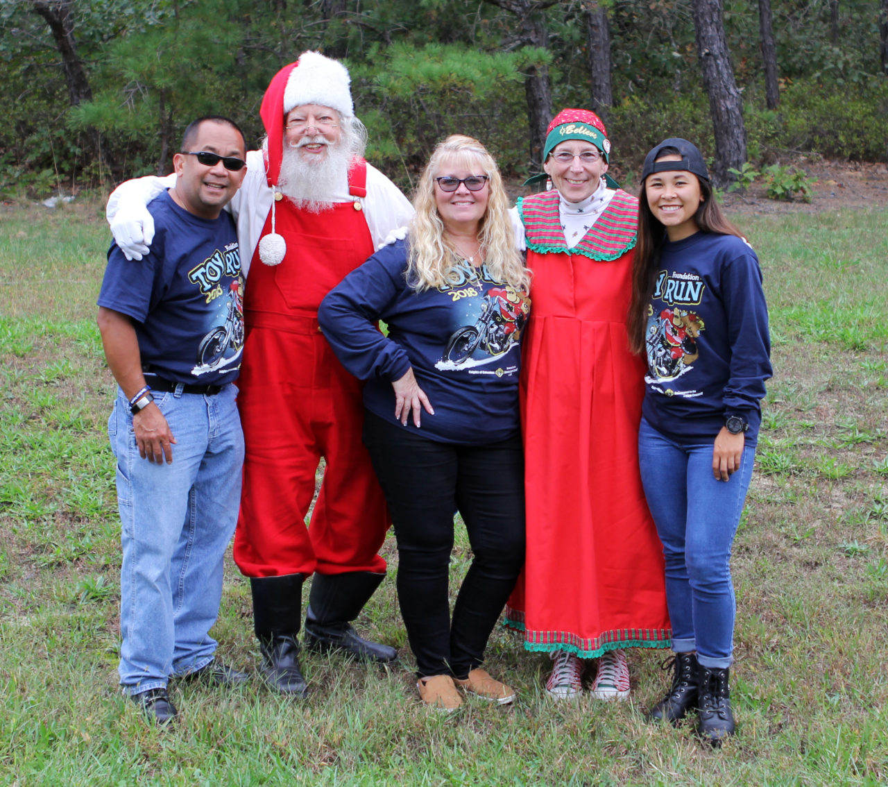 Jarin family with Santa Claus and Mrs. Claus