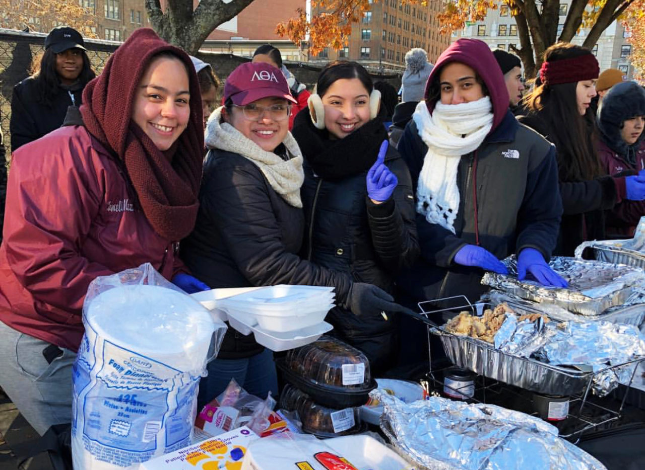 students serving food