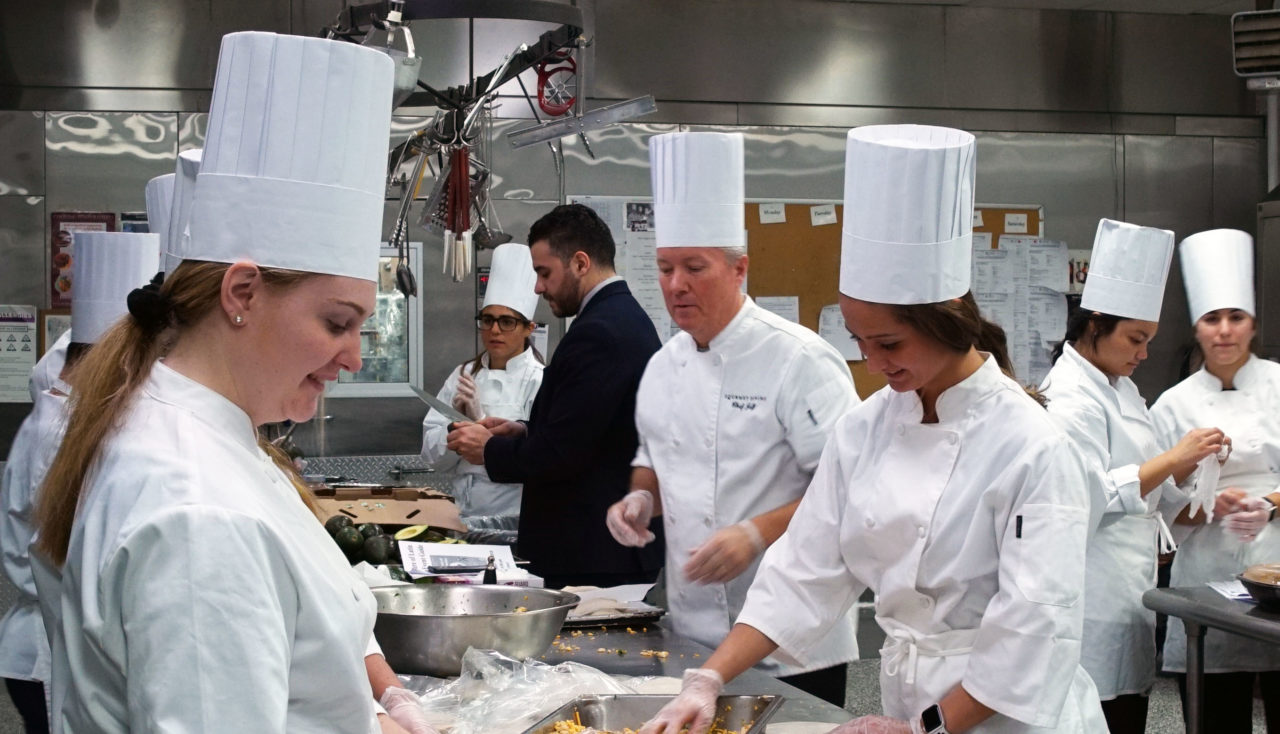 Chef Jeff Gourley of the Florham Campus Dining Hall teaches hospitality students how to prepare food