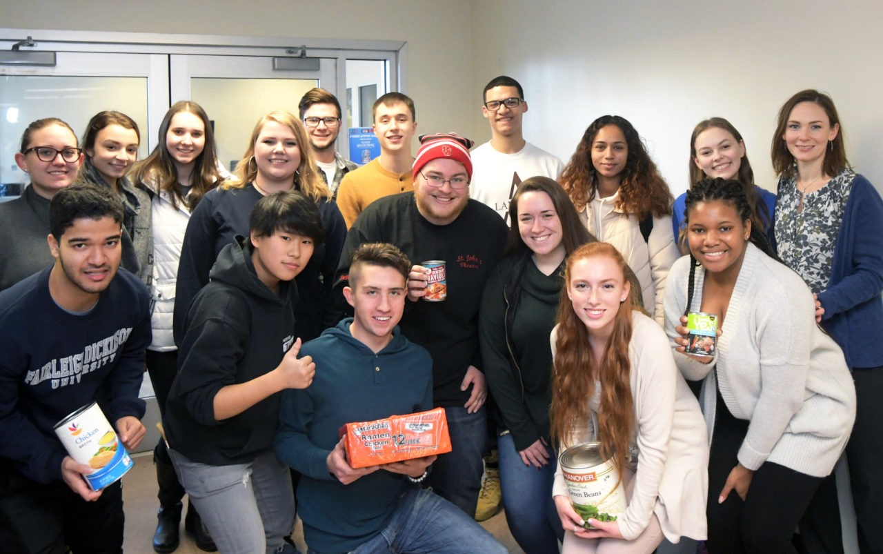 Students helping out in the Devils Care Food Pantry