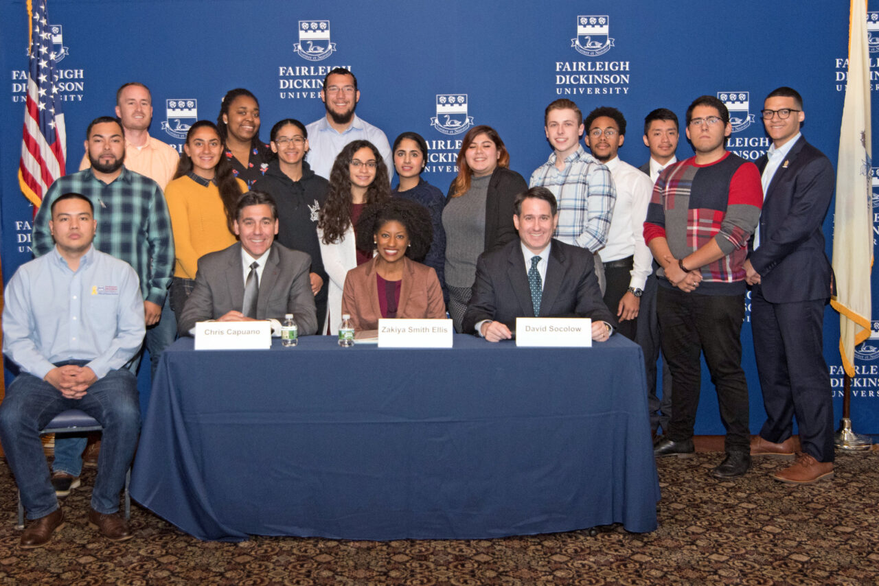 University President with students