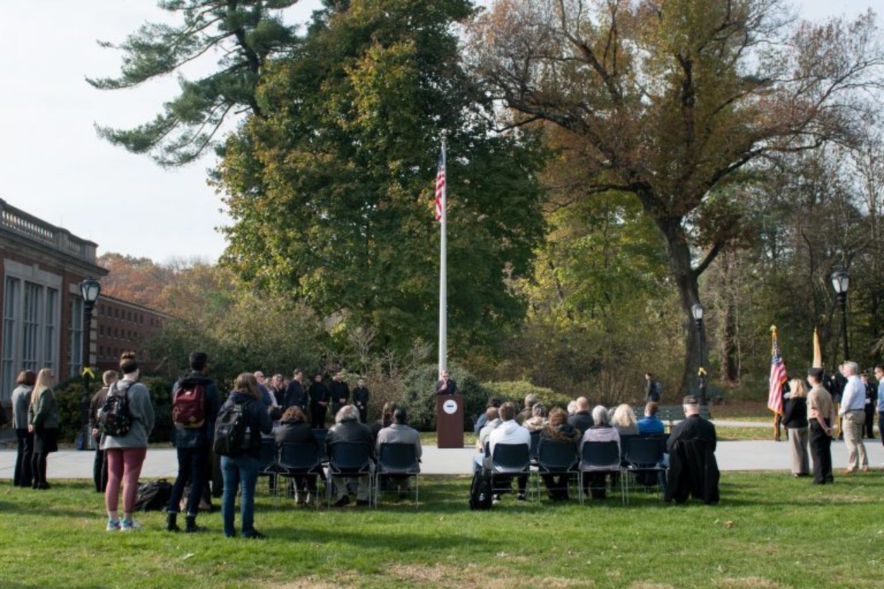 Graduate student veteran Joel Adams delivers the keynote address at the Florham Campus Veterans Day ceremony.