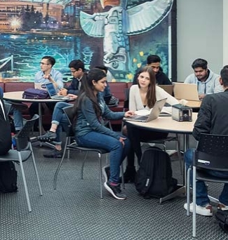 students sitting in a building on vancouver's campus