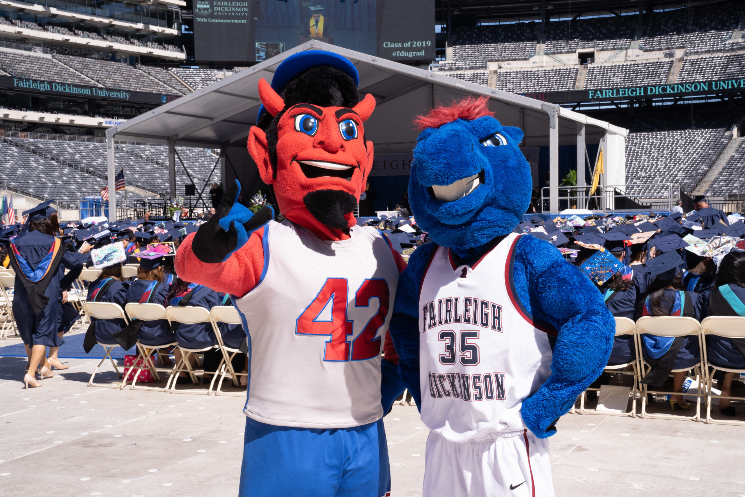 FDU mascots Ian the Devil and Knightro pose for a photo
