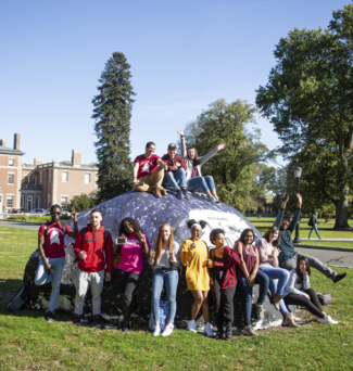 students on the rock at FDU