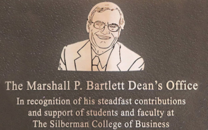 The plaque honoring Marshall P. Barlett, the Silberman College of Business dean's office has been named for him