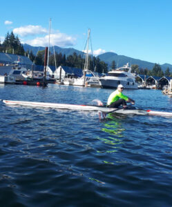 Nicolas Galeano-Monsalve showing off his rowing skills in a lake. 