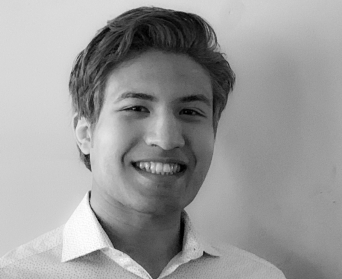 A black and white portrait of Brandon Worthen