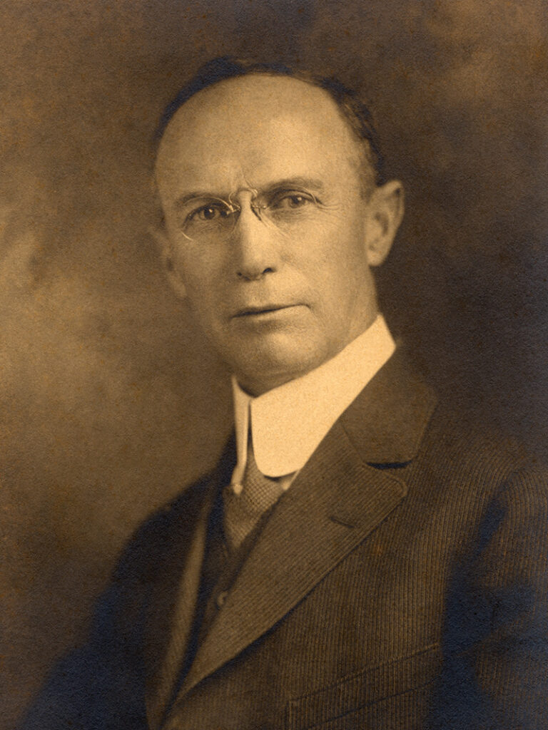 A vintage portrait of a man, circa the early 1900s.