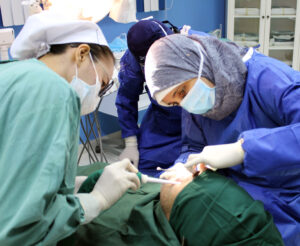 Heba Eldeeb working on a dental patient