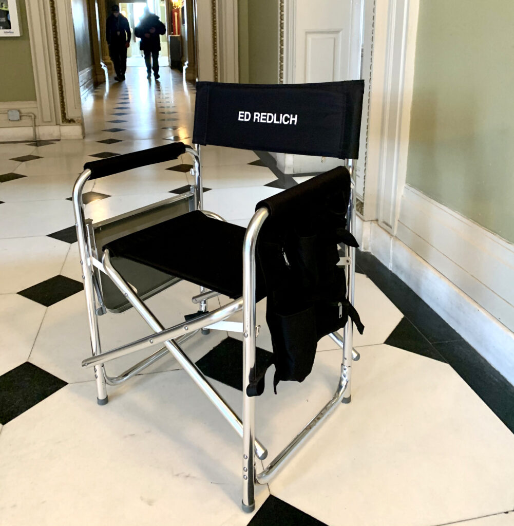 Chair that reads "Ed Redlich."