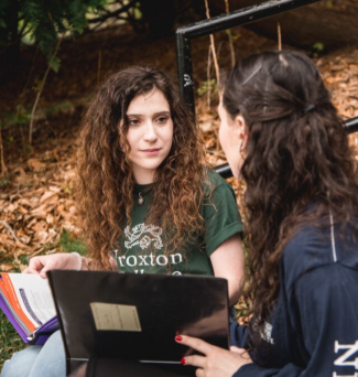 students meeting in common area