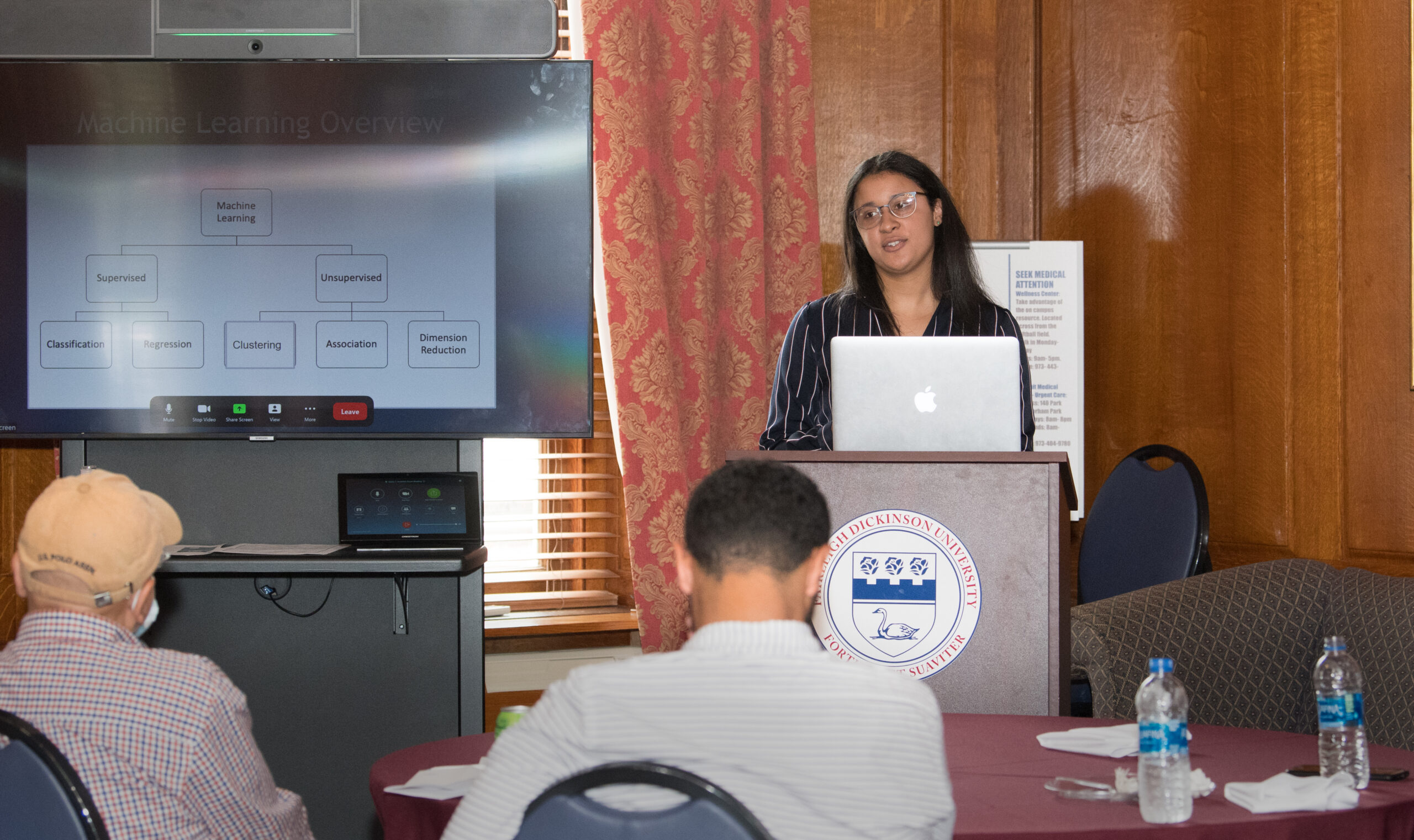 A student speak at a podium.