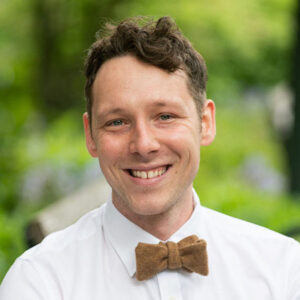 Portrait of a man wearing a bowtie.