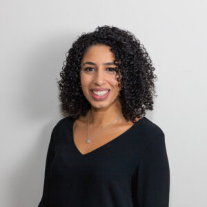 Portrait of a smiling female professor.