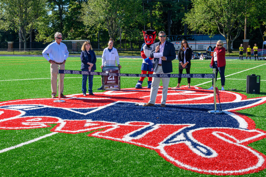 President Christopher Capuano speaks at the ribbon-cutting ceremony for the Elizabeth Ruth Hennessy Field. (Photo: Brian Lewis)