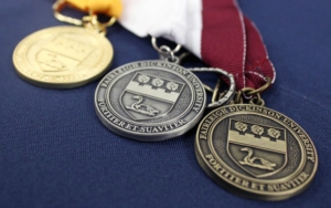 A close-up of FDU graduation medals.