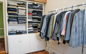 A closet in Hennessy Hall holds racks and shelves of donated business clothes for students to pick from.