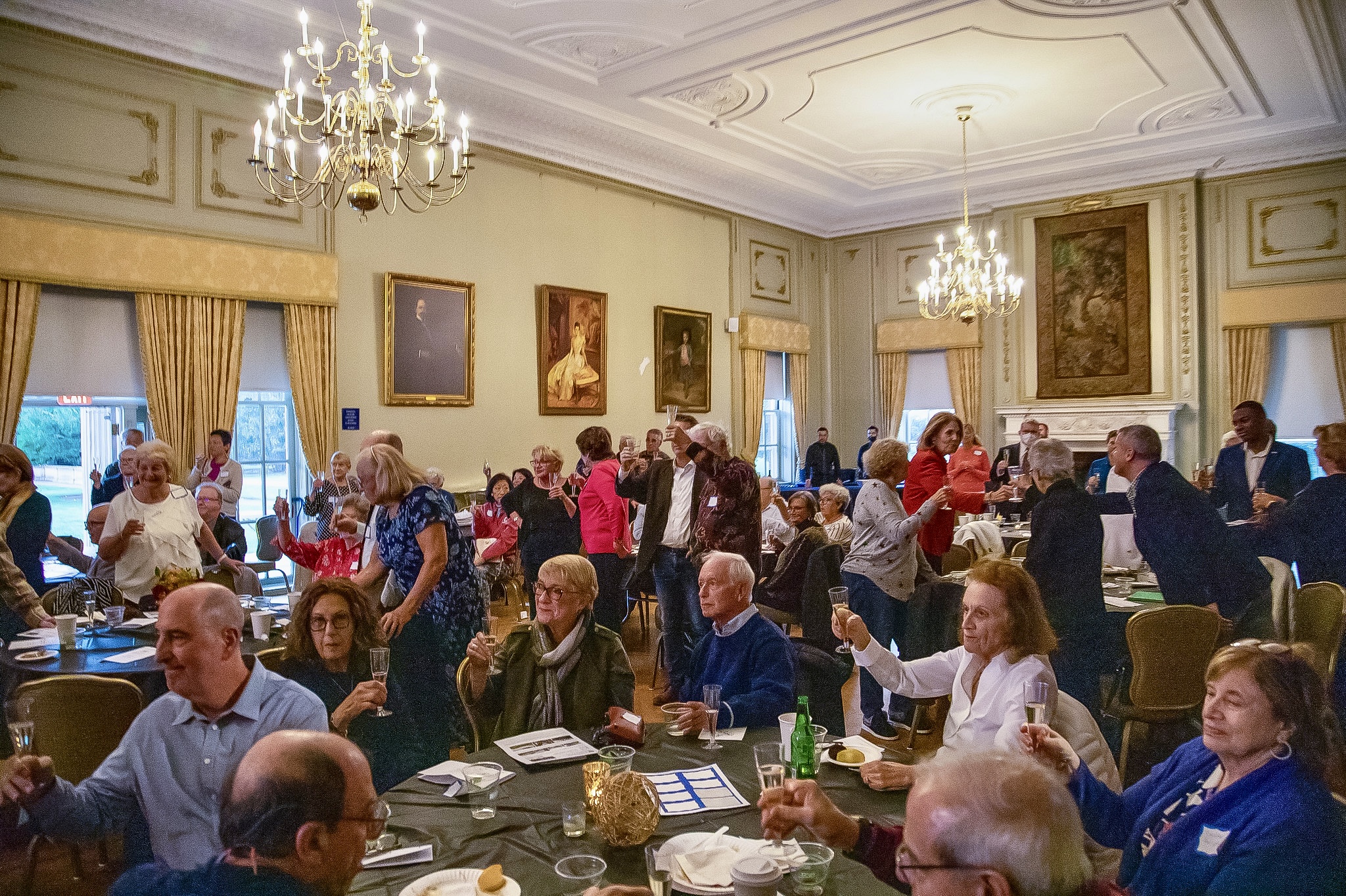 An intergenerational crowd attends the 50th anniversary celebration of the lifelong learning institute.