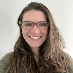 Portrait of a woman wearing glasses.