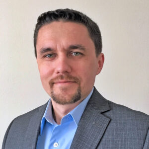 Portrait of a man in a sport coat.