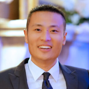 Portrait of a man in a suit.