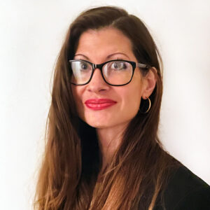 Portrait of a woman wearing glasses.