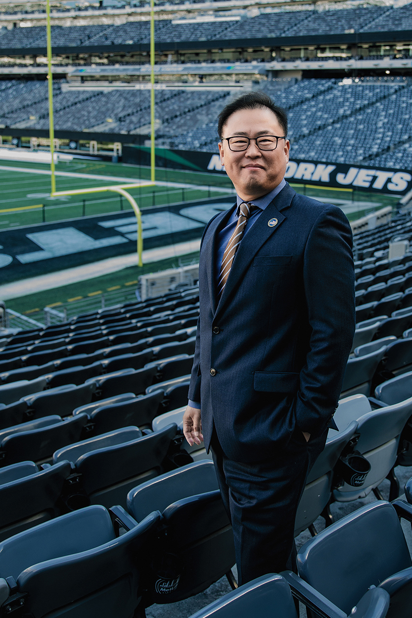 A man stands in the seats at MetLife Stadium.