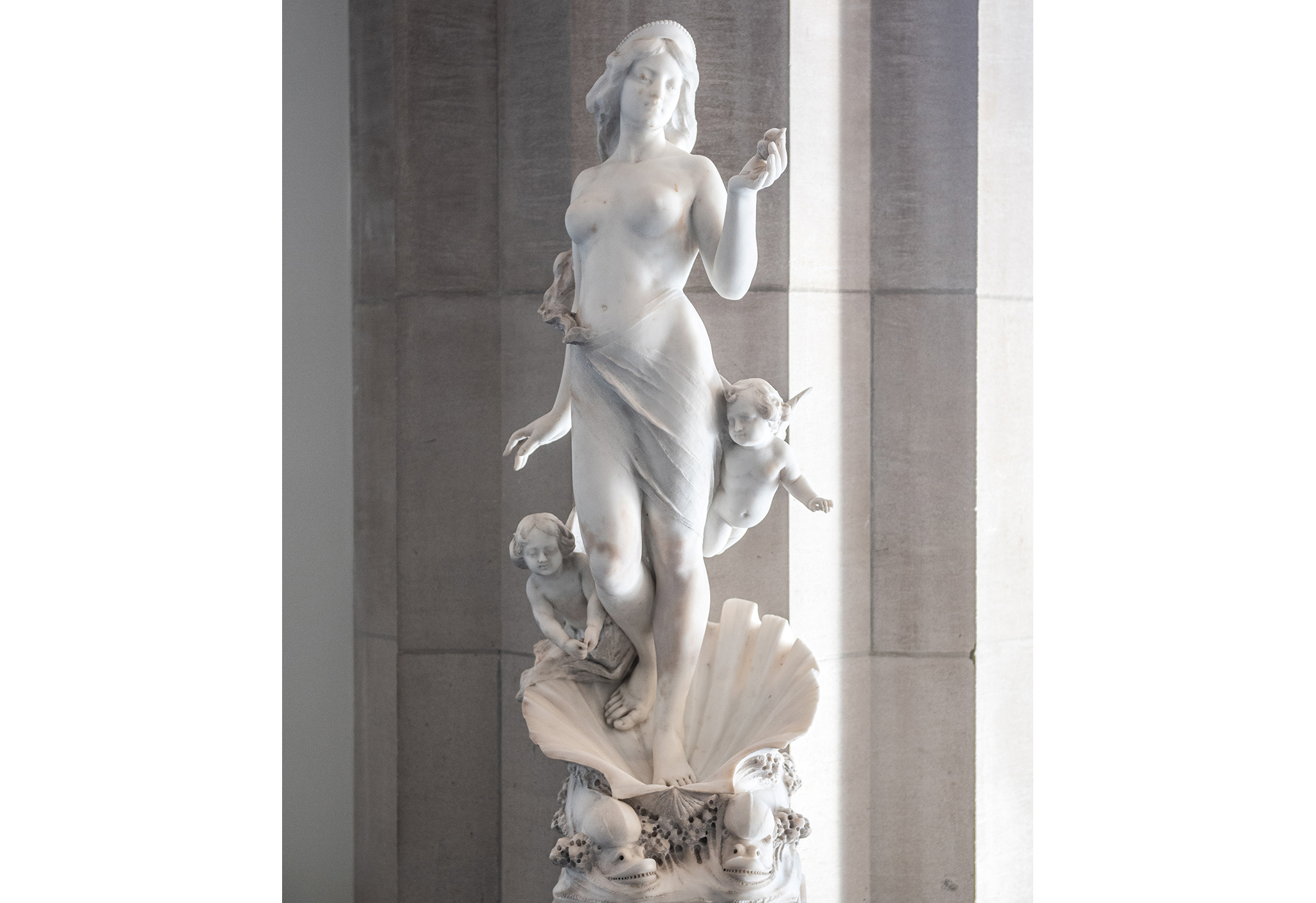 A statue of Venus emerging from the clamshell.