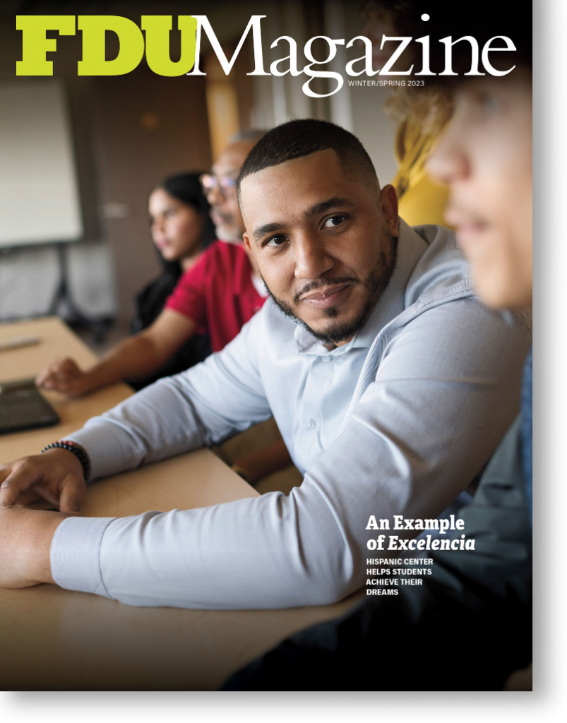 The cover of FDU Magazine shows a student sitting a table.