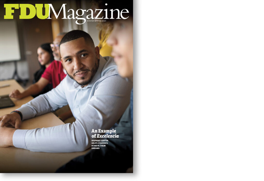 The cover of FDU Magazine shows a student sitting a table.