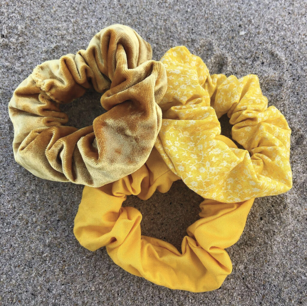 Three yellow scrunchies