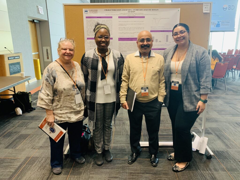 Trishauna-Aliyah Gordon, Bianca Brattoli, Dr. Ish Kumar, and another person presenting research.