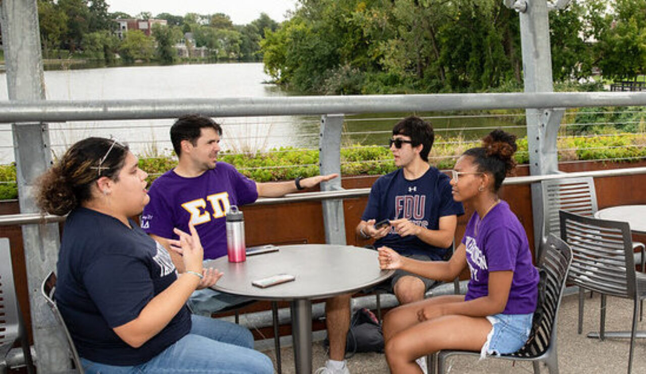 four students on the Teaneck campus