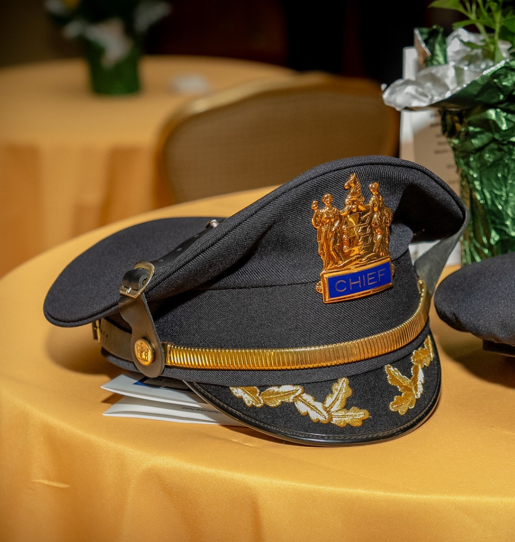 a close-up on a police chief hat
