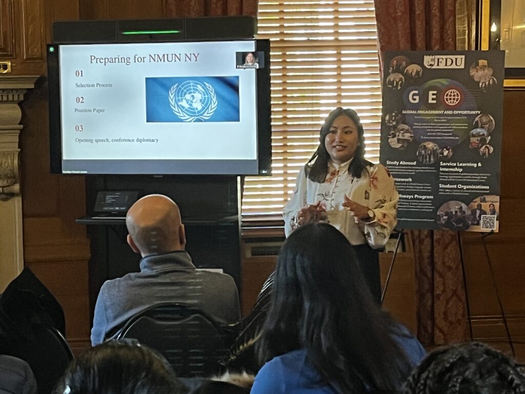 A young woman gives a presentation.