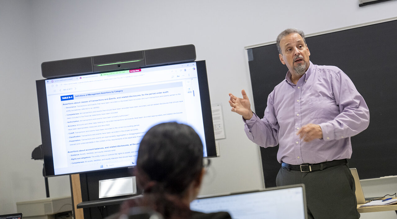 teacher teaching at FDU