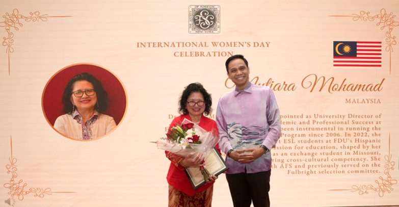 Mutiara Mohamad, left, receiving her award in New York City.