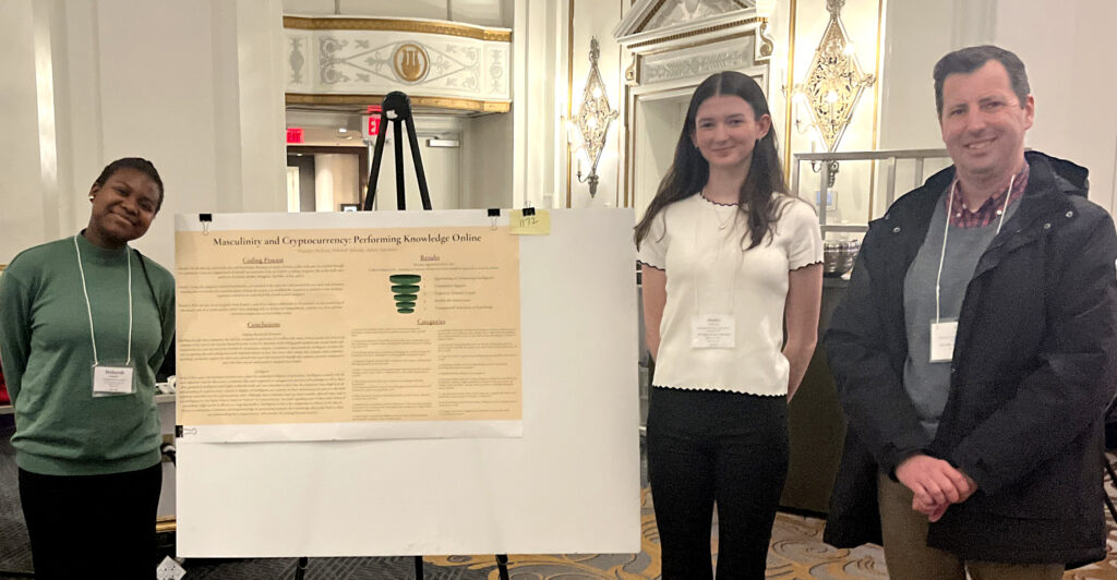 Two students with Dan Cassino at the ESS conference
