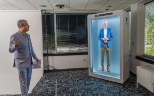 Two men demonstrate new technology