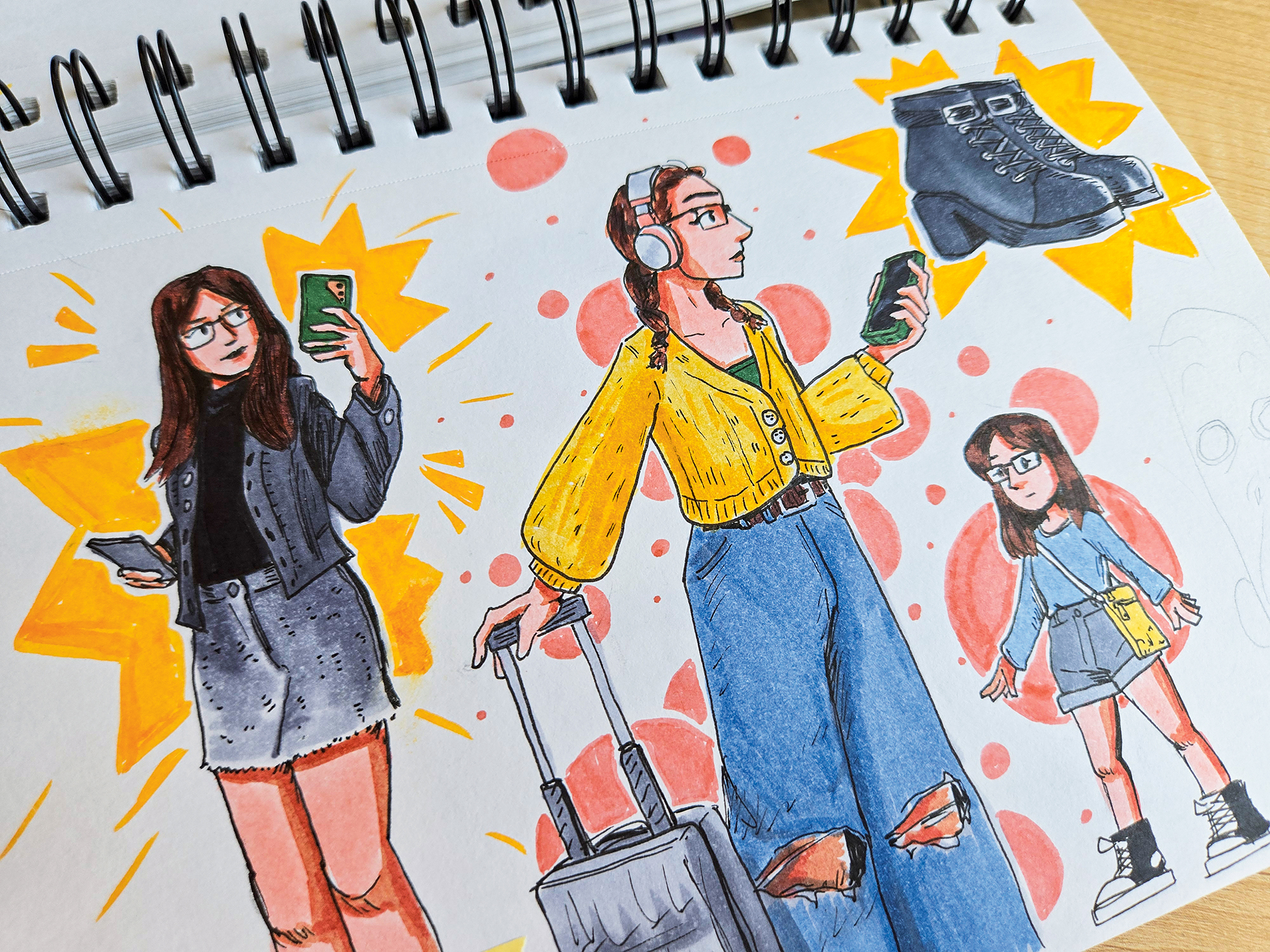 A sketchbook filled with colorful drawings of women in bright outfits.